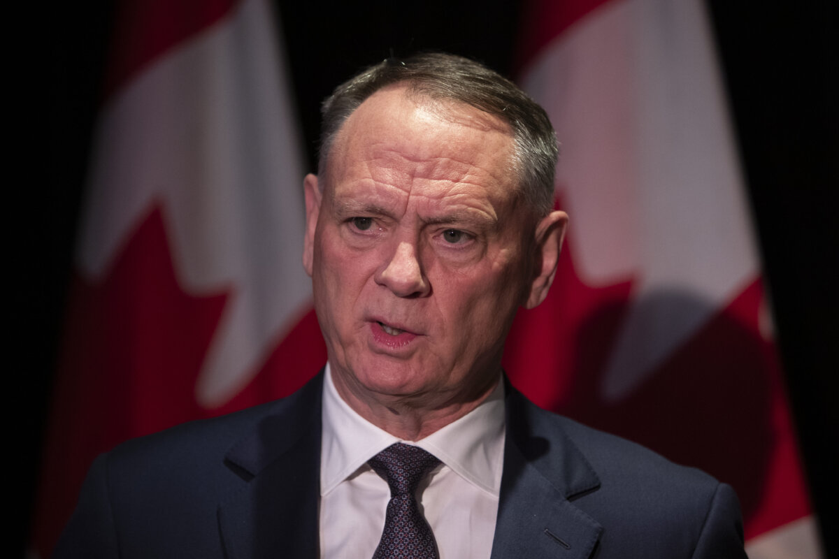 Minister of National Defence David McGuinty responds to questions at the Liberal caucus meeting in Edmonton on Sept. 10, 2025. (The Canadian Press/Amber Bracken)