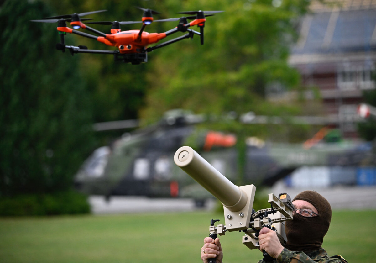 A German soldier demonstrates the use of a handheld drone jammer, in Hamburg, Germany, on Sept. 26, 2025. (Tobias Schwarz/ AFP/Getty Images)