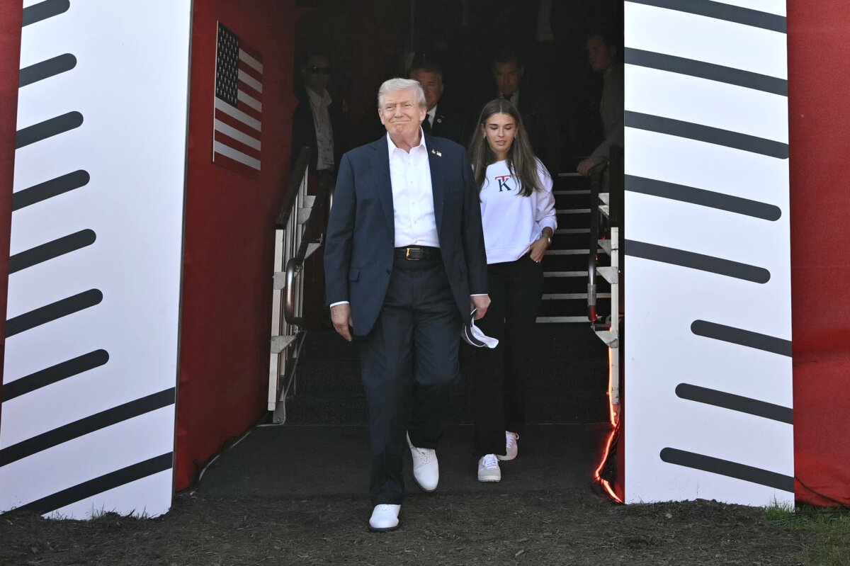 President Donald Trump, along with his granddaughter Kai Madison Trump, attends the 2025 Ryder Cup at Black Course at Bethpage State Park Golf Course in Farmingdale, N.Y., on Sept. 26, 2025. (Mandel Ngan/Pool via Getty Images)