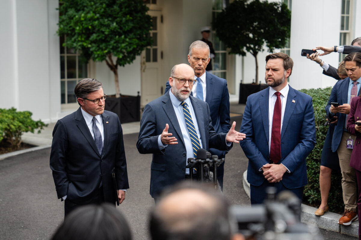 Office of Management and Budget Director Russel Vought, joined by Vice President JD Vance, Speaker of the House Mike Johnson (R-La.), and Senate Majority Leader John Thune (R-S.D.), speaks at the White House on Sept. 29, 2025. (Madalina Kilroy/The Epoch Times)