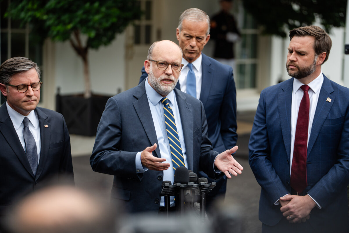 Director of the Office of Management and Budget, Russell Vought, joined by Vice President JD Vance, Speaker of the House Mike Johnson (R-La.), and Senate Majority Leader John Thune (R-S.D.), speaks at the White House on Sept. 29, 2025. (Madalina Kilroy/The Epoch Times)