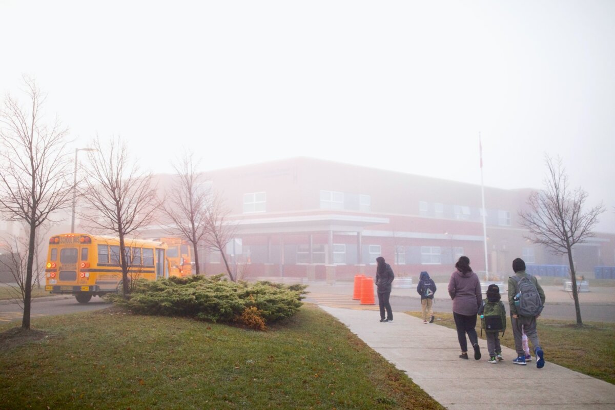 A file photo of children arriving at a school in Milton, Ont., on Nov. 4, 2022. (The Canadian Press/Nick Iwanyshyn)