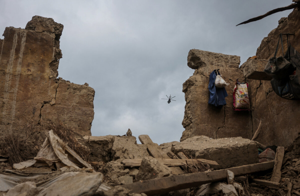 A Taliban military helicopter flies carrying injured victims of a deadly magnitude-6 earthquake that struck Afghanistan on Sunday, in Mazar Dara, Kunar province, Afghanistan, on Sept. 2, 2025. (Sayed Hassib/Reuters)