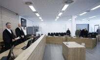 Former Chinese Aide to German Lawmaker Sentenced for Spying for China