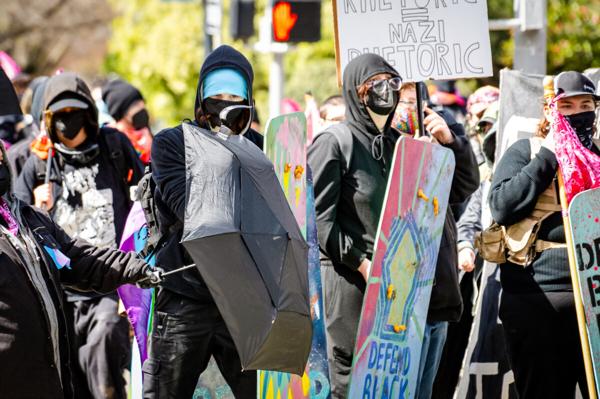 Antifa activists gather in Sacramento, Calif., on March 28, 2023. (John Fredricks/The Epoch Times)