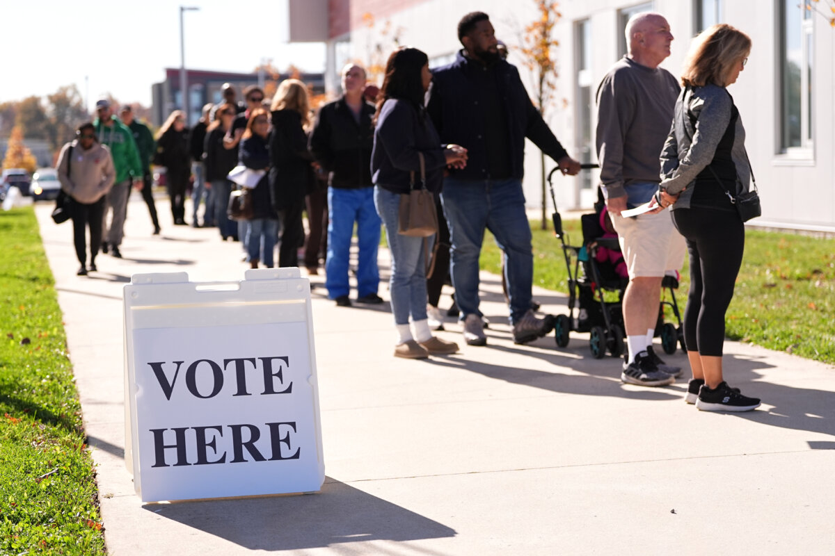 Voters wait in line to cast there ballots at a polling place at Rowan College in Mount Laurel, N.J., on Oct. 27, 2025. (Matt Rourke/AP Photo)