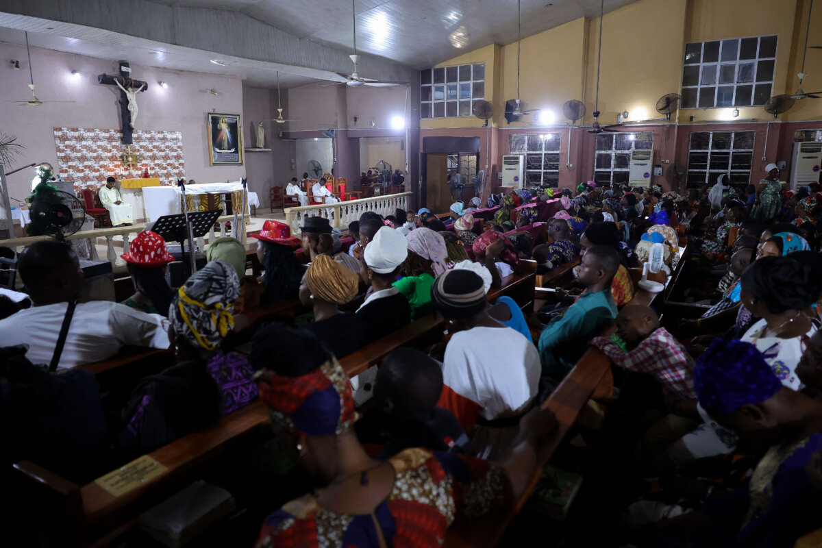 Christians gather for a service held at Most Pure Heart of Mary Catholic Church in Ijebu Imushin, Nigeria, on Dec. 31, 2023. (Samuel Alabi/AFP via Getty Images)