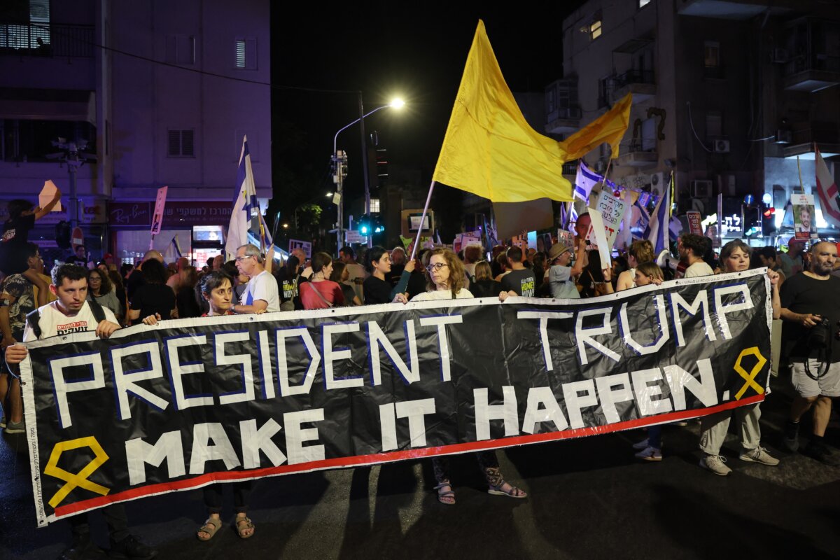 Demonstrators in front of the Likud Party building in Tel Aviv, Israel, on Sept. 30, 2025. (Jack Guez/AFP)