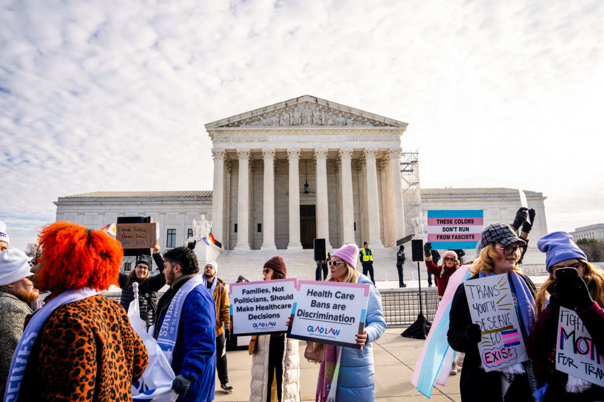 Protesters in front of the Supreme Court as the high court hears a case over banning gender procedures for minors, in Washington on Dec. 4, 2024. (Madalina Vasiliu/The Epoch Times)