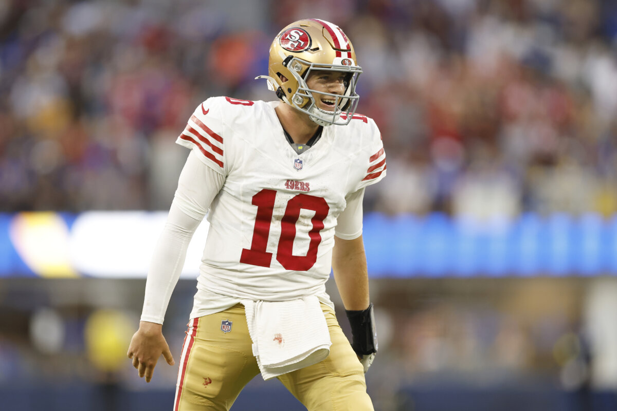 Mac Jones #10 of the San Francisco 49ers reacts after throwing a touchdown pass during the second quarter against the Los Angeles Rams at SoFi Stadium in Inglewood, Calif., on Oct. 2, 2025. (Ronald Martinez/Getty Images)