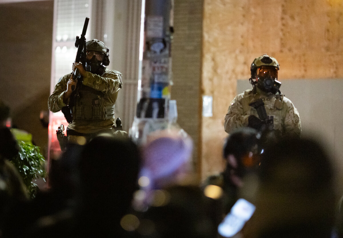 Protestors gather in front of Immigration and Customs Enforcement offices in Portland, Ore., on Oct. 4, 2025. (John Fredricks/The Epoch Times)