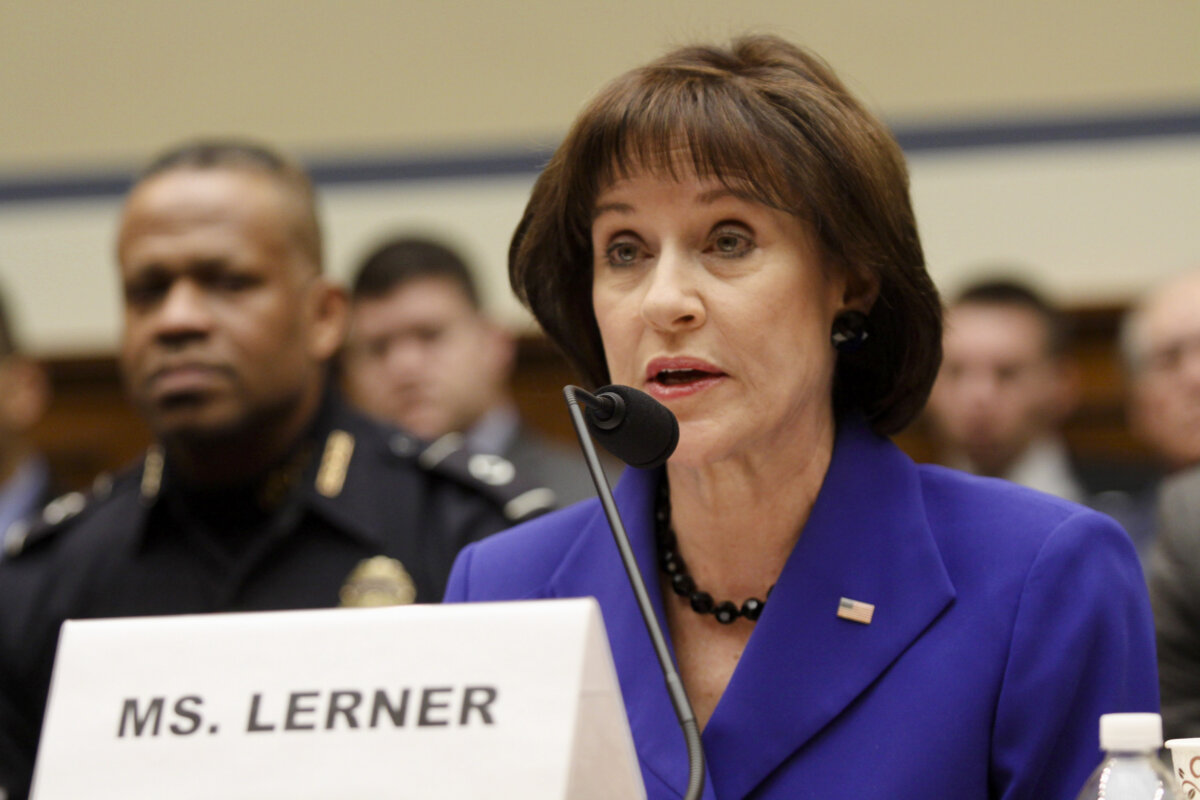 Former Internal Revenue Service (IRS) official Lois Lerner speaks on Capitol Hill in Washington, Wednesday, March 5, 2014, during the House Oversight and Government Reform Committee hearing on the agency's targeting of Tea Party groups, where she invoked her constitutional right not to incriminate herself. (AP Photo/Lauren Victoria Burke)