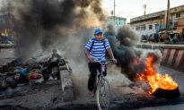 Day in Photos: Protests In Madagascar, Pollution Response Exercise, and Buffalo Racing