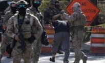 2 Charged in Chicago After Federal Agents’ Vehicles Rammed