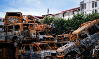 Day in Photos: The Burned Parliament in Nepal, Keir Starmer in India, and Livestock Summit
