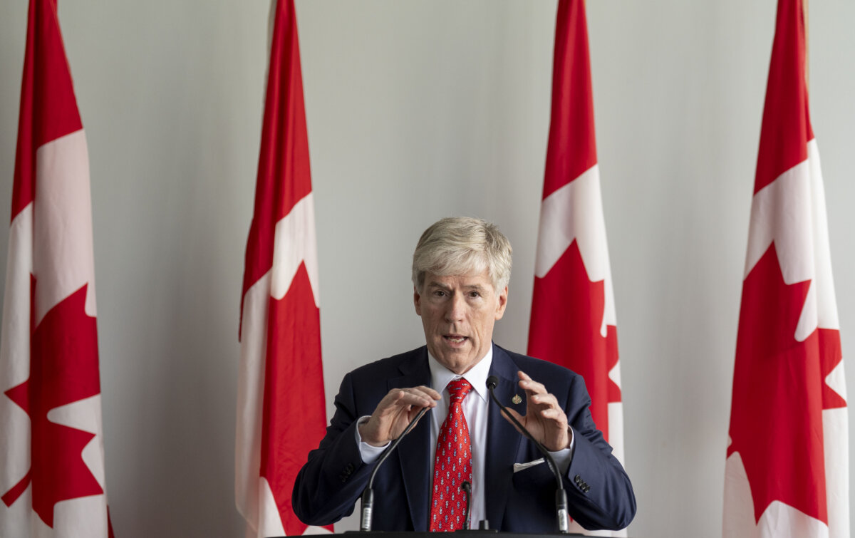 Minister of Energy and Natural Resources Tim Hodgson announces an investment of $22 million to fund domestic battery innovation and manufacturing in Montreal, on Oct. 3, 2025. (The Canadian Press/Christinne Muschi)