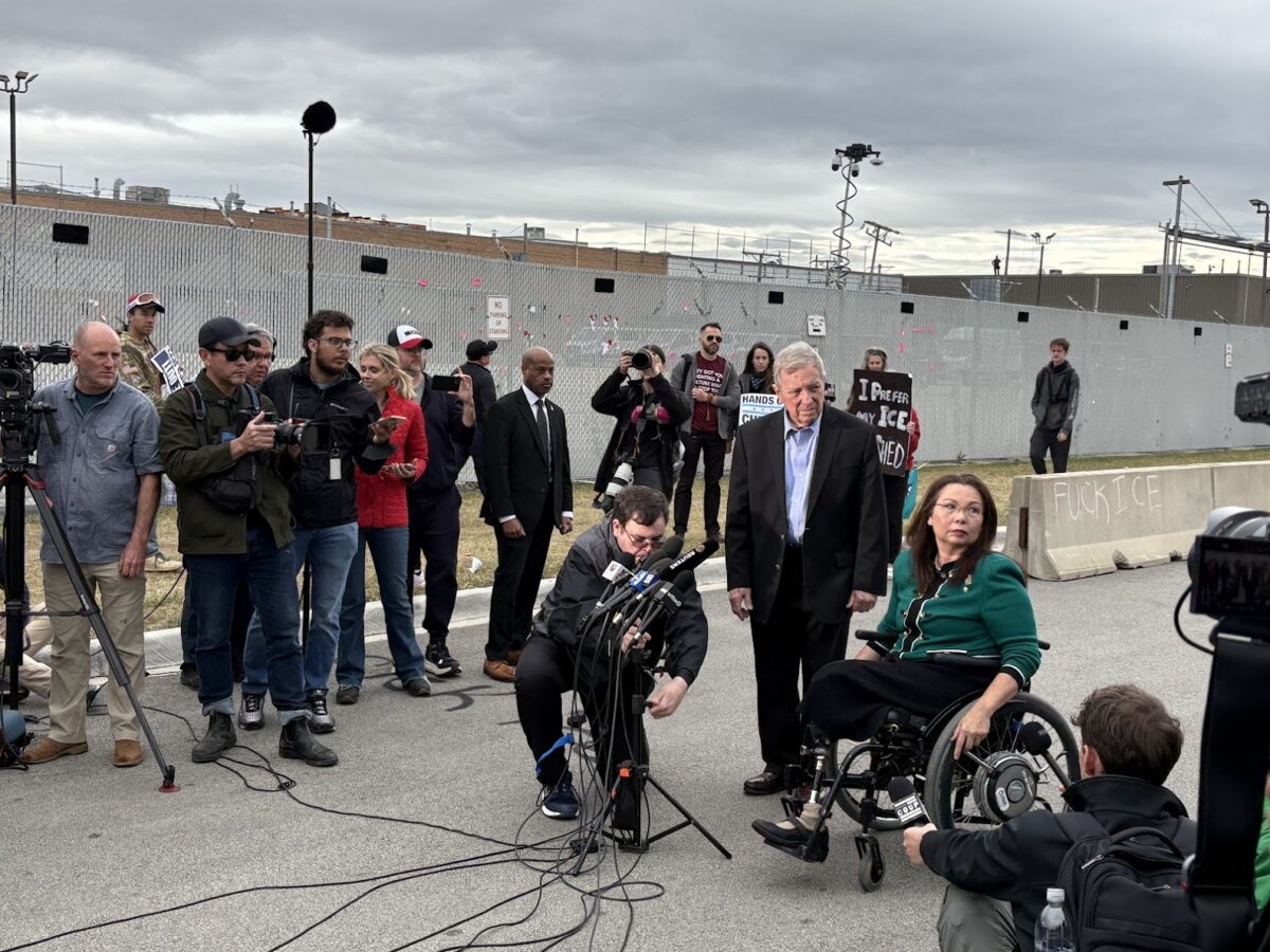 Sens. Tammy Duckworth and Dick Durbin (D-Ill.) speak to reporters outside of an Immigration and Customs Enforcement (ICE) facility in Broadview, Ill., on Oct. 10, 2025. (Nathan Worcester/The Epoch Times)
