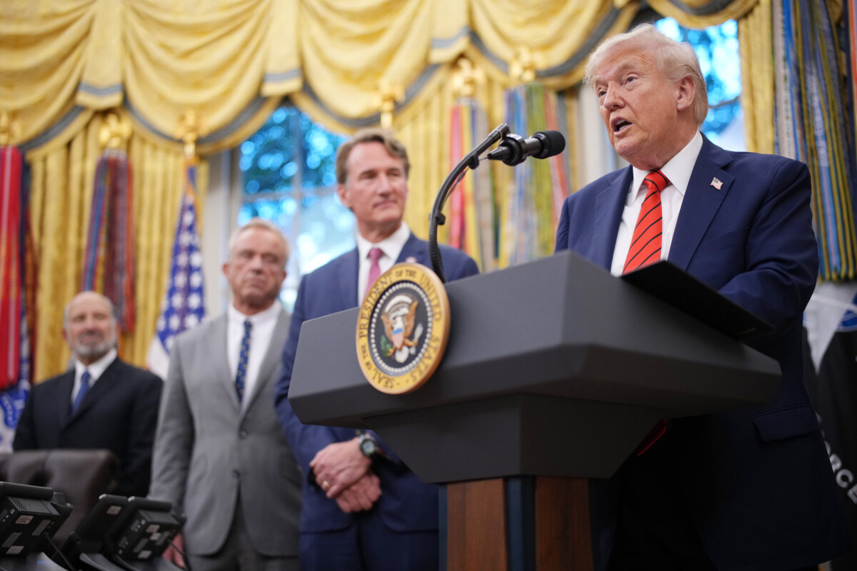 President Donald Trump speaks in the Oval Office with (L-R) Commerce Secretary Howard Lutnick, Health and Human Services Secretary Robert F. Kennedy Jr., and Virginia Gov. Glenn Youngkin on Oct. 10, 2025. (Andrew Harnik/Getty Images)