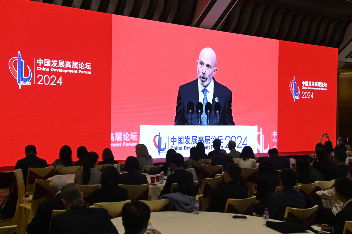 Evan Greenberg, chairman and chief executive officer of Chubb Ltd., on a livestreaming screen as he speaks at the economic summit held for the China Development Forum at the Diaoyutai State Guesthouse in Beijing on March 24, 2024. (Parker Song/Pool/AFP via Getty Images)