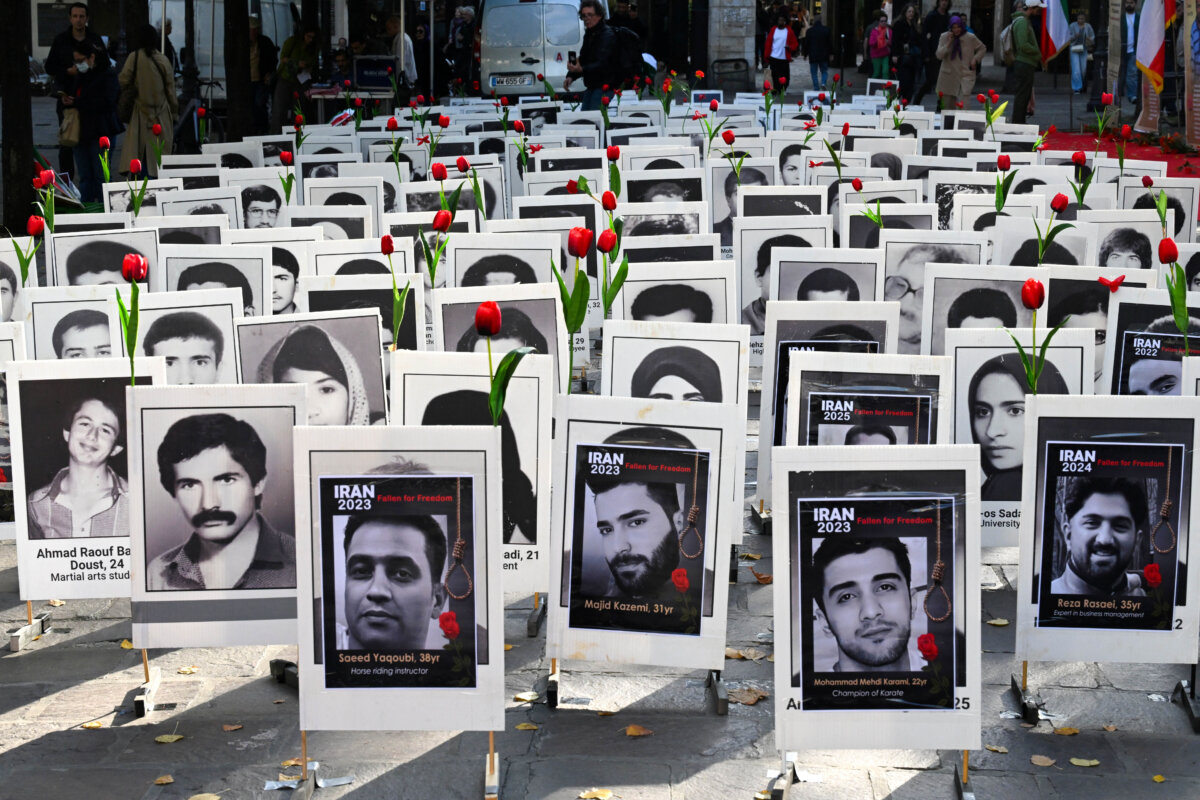 Portraits of people executed by the government of the Islamic Republic of Iran, displayed during a demonstration by Franco-Iranian associations, including the Committee to Support Human Rights in Iran, a day after the World Day Against the Death Penalty, in central Paris on Oct. 11, 2025. (Martin Lelievre/AFP via Getty Images)