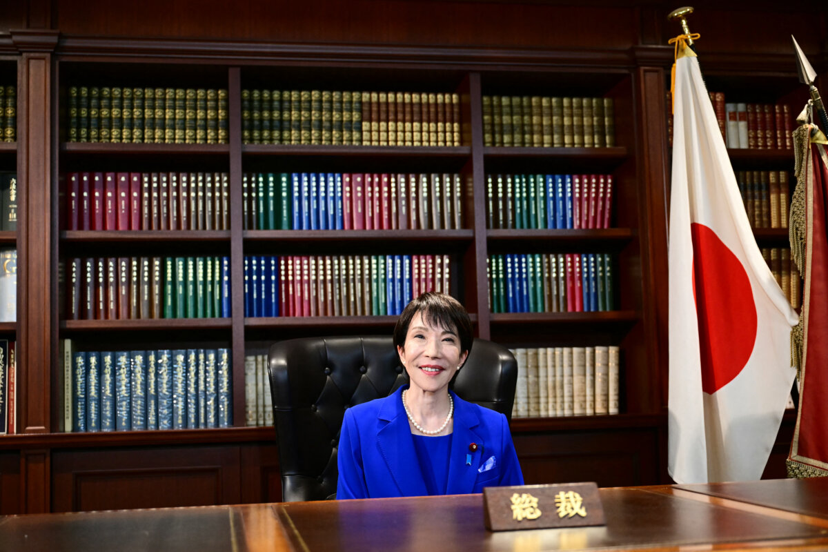 Sanae Takaichi, the newly elected leader of Japan's ruling party, the Liberal Democratic Party (LDP), poses in the party leader's office after the LDP leadership election in Tokyo on Oct. 4, 2025. (Yuichi Yamazaki /POOL/AFP via Getty Images)