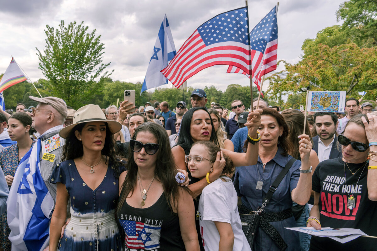 People hold Israeli and American flags as they attend a commemoration for the victims of the Oct. 7 Hamas attack on Israel, in Central Park in New York City on Oct. 7, 2025. (Adam Gray/Getty Images)
