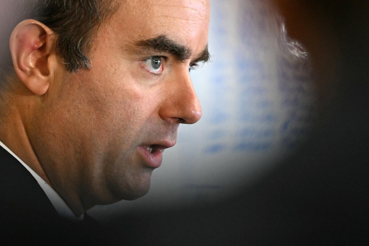 Reappointed French Prime Minister Sébastien Lecornu looks on as he visits a police station in L'Haÿ-les-Roses outside Paris on Oct. 11, 2025. (Martin Lelievre, Pool Photo via AP)