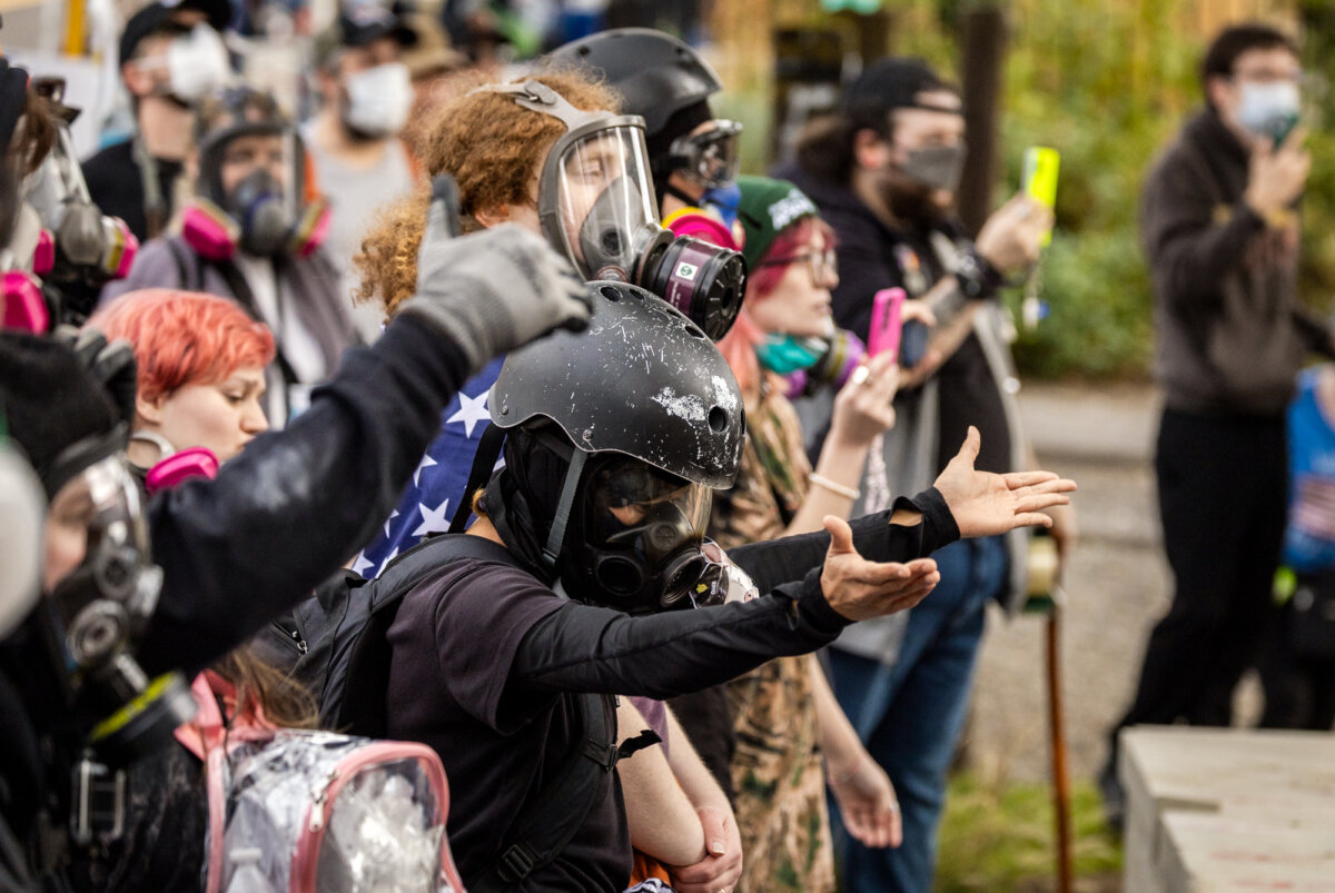 Protesters gather in front of Immigration and Customs Enforcement offices in Portland, Ore., on Oct. 4, 2025. (John Fredricks/The Epoch Times)