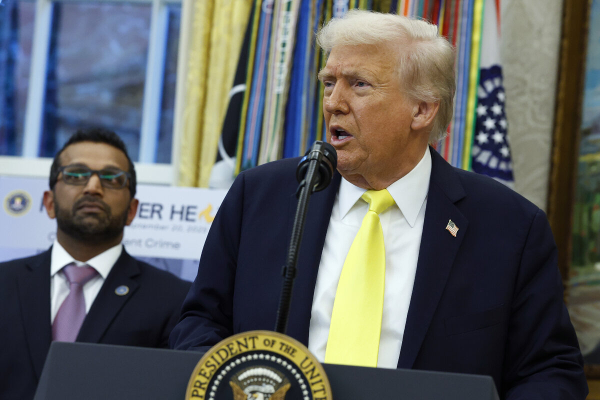 President Donald Trump, with FBI Director Kash Patel (L) listening, speaks in Washington on Oct. 15, 2025. (Kevin Dietsch/Getty Images)