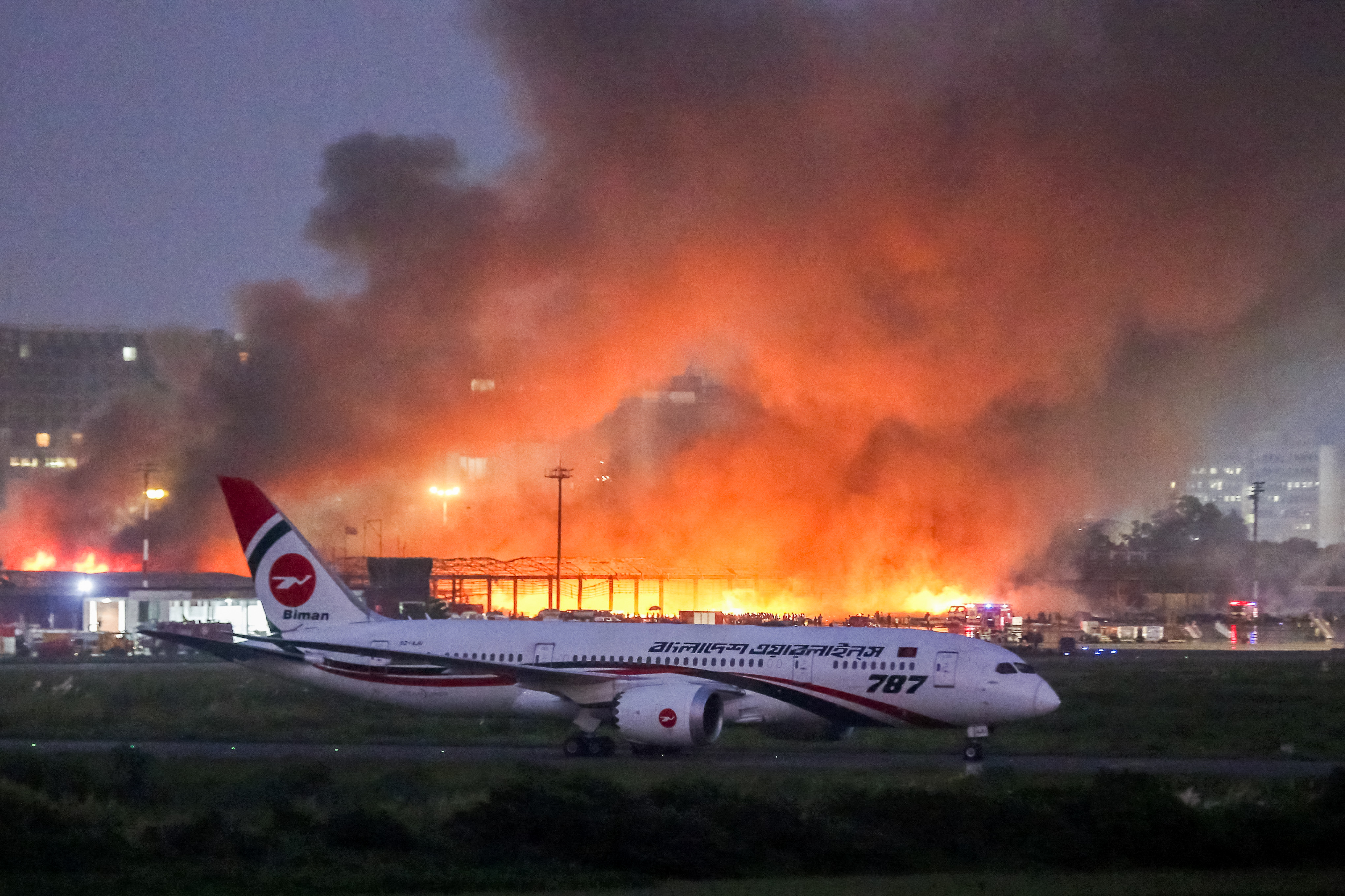 Day in Photos: Fire at Bangladesh Airport, Protest in Washington, and Fuji Mount