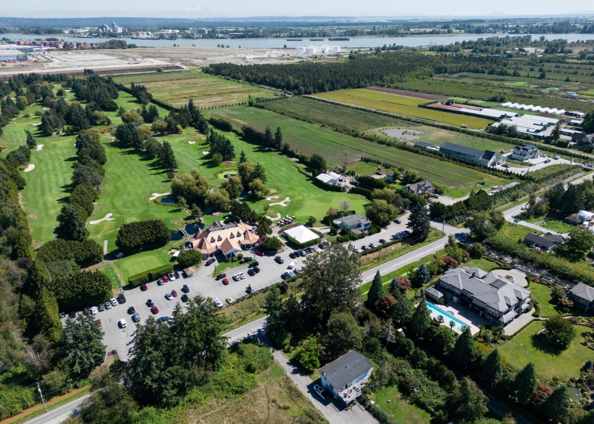Houses and farmland along No. 6 Road and the Country Meadows Golf Course, which fall within the boundaries of a Cowichan Nation aboriginal title claim, are seen in an aerial view in Richmond, B.C., on Aug. 22, 2025. (The Canadian Press/Darryl Dyck)