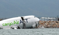 Cargo Aircraft Skids Off Hong Kong Runway Into Sea, Killing 2 Airport Workers