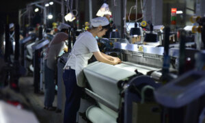China’s Economy Grows at Slowest Pace in a Year