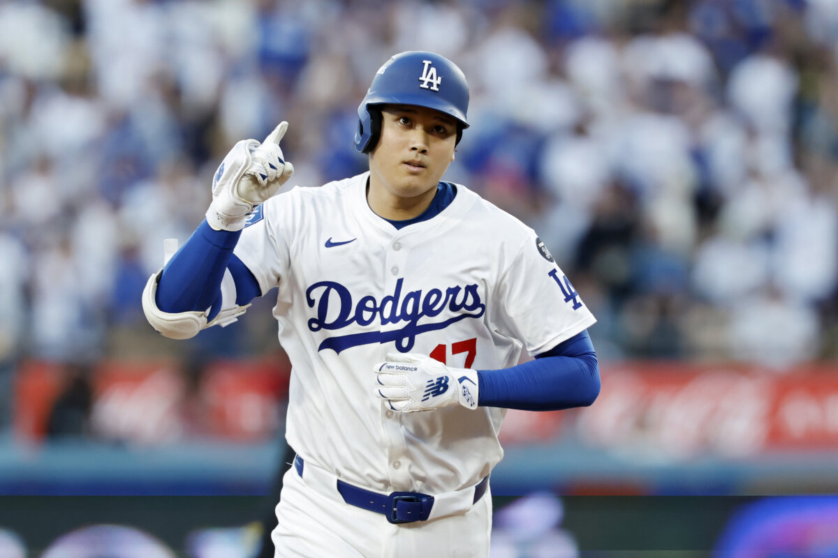 Shohei Ohtani (17) of the Los Angeles Dodgers rounds the bases after hitting a home run during the first inning against the Milwaukee Brewers in game four of the National League Championship Series at Dodger Stadium in Los Angeles on Oct. 17, 2025. (Ronald Martinez/Getty Images)