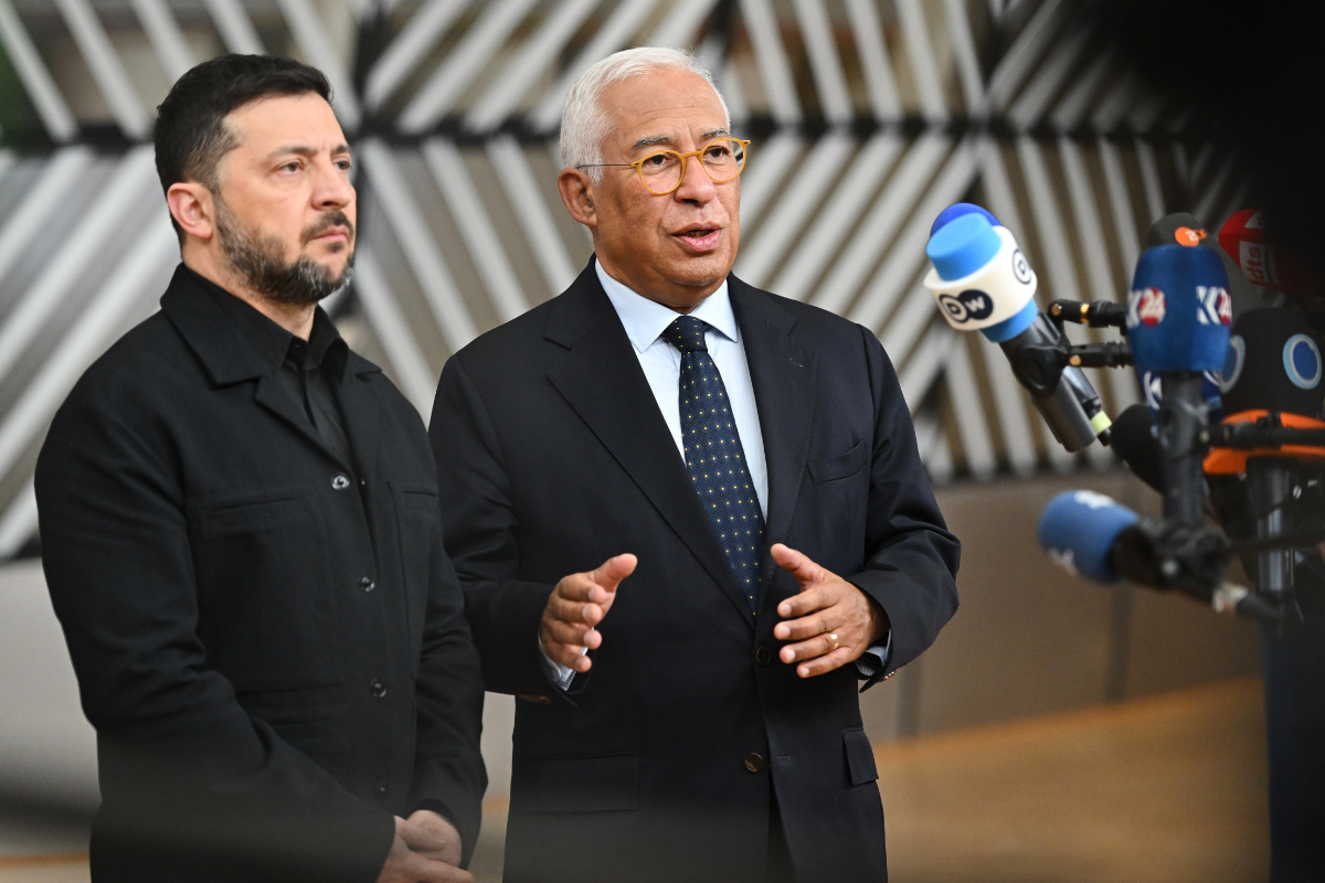 Ukrainian President Volodymyr Zelenskyy (L) and European Council President Antonio Costa (R) speak with reporters as they arrive for an EU Summit at the European Council building in Brussels, Belgium, on Oct. 23, 2025. (Harry Nakos/AP)