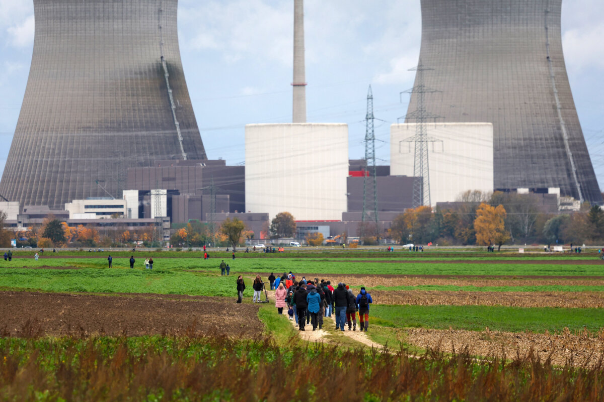 People gather near the decommissioned Gundremmingen nuclear power plant in southern Germany prior to the demolition of the plant's cooling towers on Oct. 25, 2025, as part of the country’s nuclear phase-out. (Karl-Josef Hildenbrand/AFP via Getty Images)