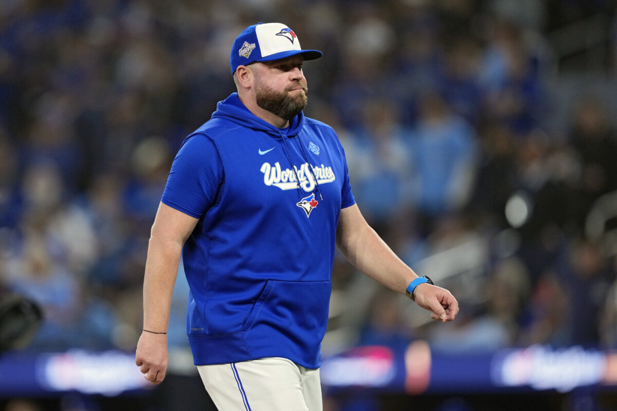 Manager John Schneider #14 of the Toronto Blue Jays walks to the dugout during the fifth inning against the Los Angeles Dodgers in game one of the 2025 World Series at Rogers Center in Toronto, Ontario on October 24, 2025. (Mark Blinch/Getty Images)