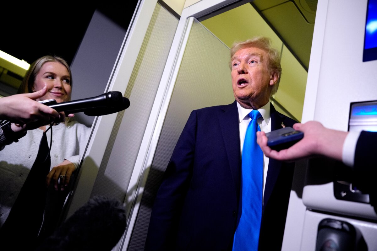 U.S. President Donald Trump speaks to members of the media during a refuelling stop at Al-Udeid Air Base in Abu Nakhlah, Qatar, on the way to Malaysia on Oct. 25, 2025. (Andrew Harnik/Getty Images)