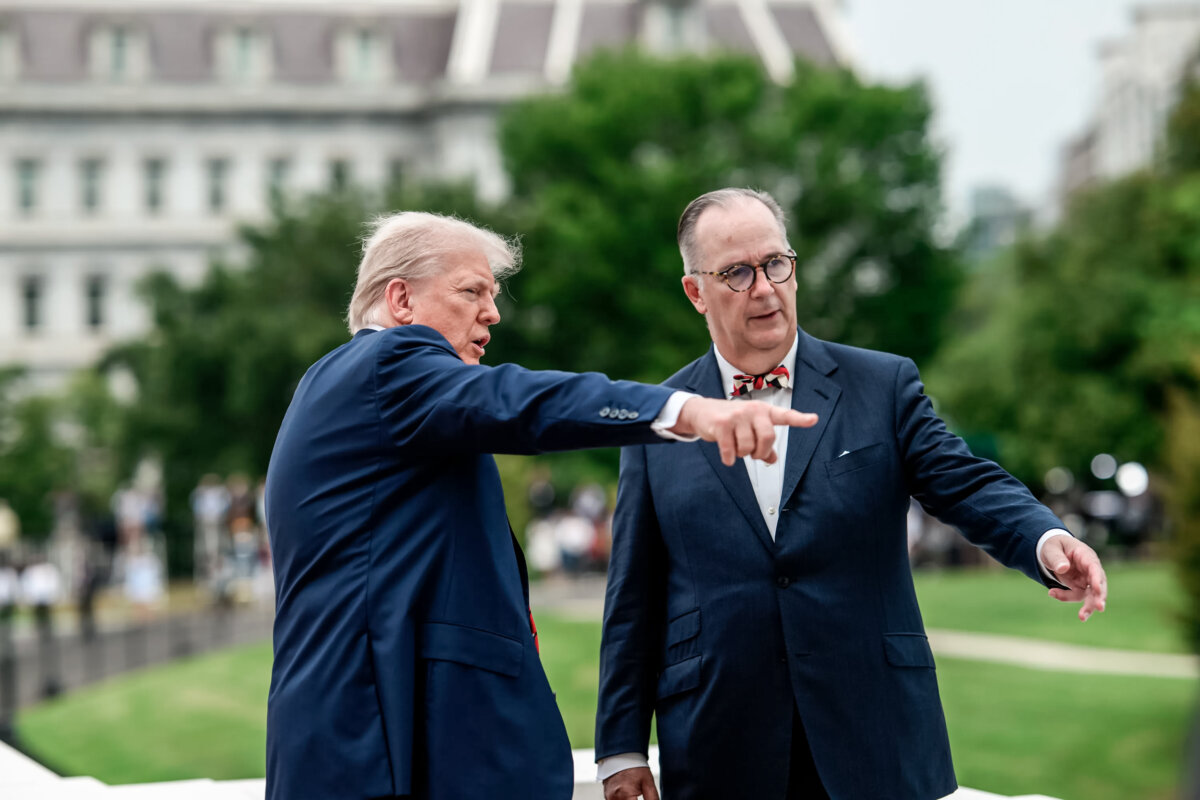 President Donald Trump speaks with architect James McCrery on the White House roof on Aug. 5, 2025. Trump tapped McCrery, a classical design specialist, to lead the new ballroom project. (The White House)