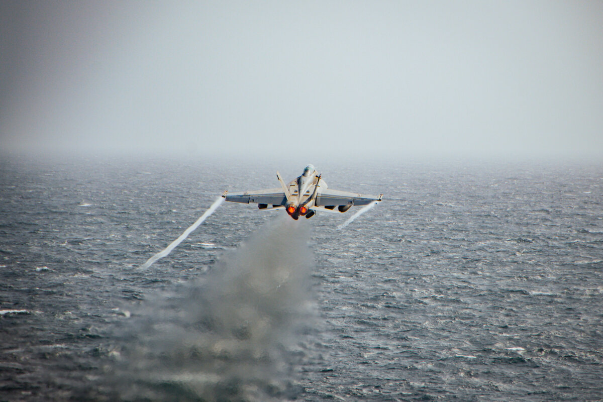 An F/A-18F Super Hornet, attached to Strike Fighter Squadron 22, launches from the flight deck of the Nimitz-class aircraft carrier USS Nimitz during flight operations in the U.S. Central Command area of responsibility on Aug. 26, 2025. (Official U.S. Navy photo)