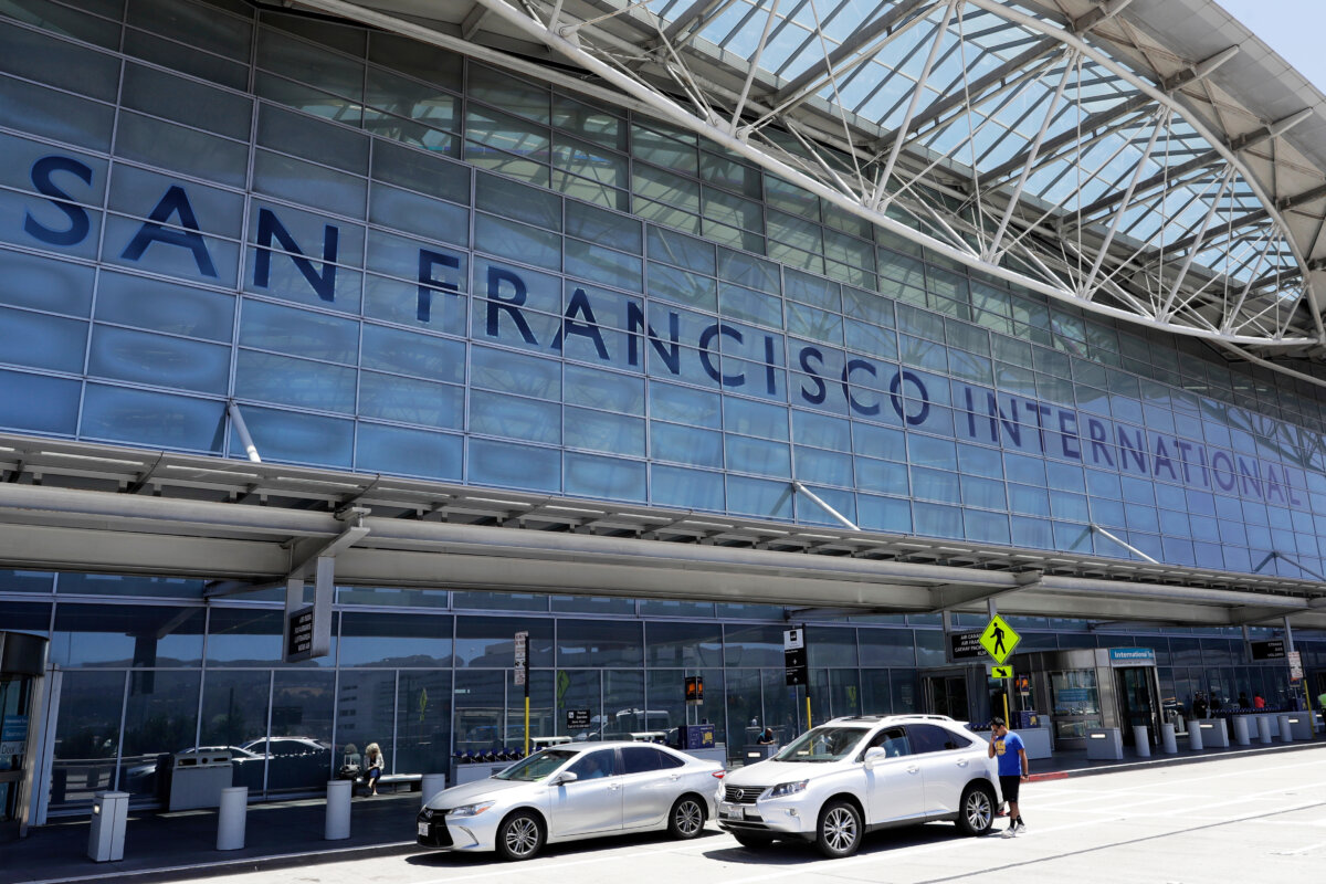 Vehicles wait outside the international terminal at San Francisco International Airport in San Francisco on July 11, 2017. (Marcio Jose Sanchez/AP Photo)