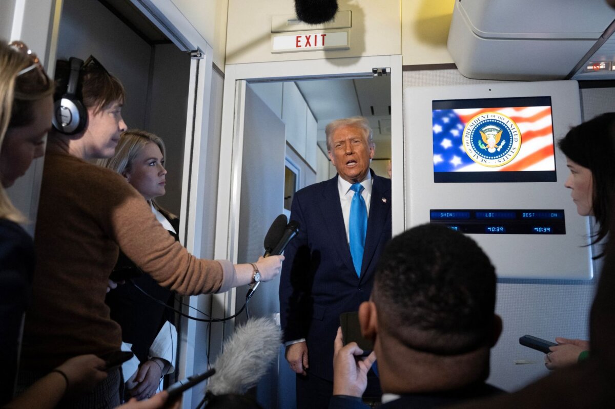 President Donald Trump speaks aboard Air Force One while traveling from Japan to South Korea on Oct. 29, 2025. (Andrew Caballero-Reynolds/AFP via Getty Images)