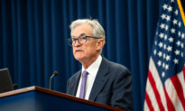 Fed Cuts Rates by Quarter Point