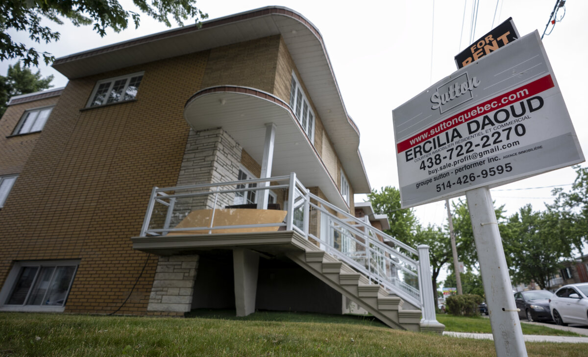 A “For Rent” sign outside a duplex in the Montreal borough of Lasalle on June 26, 2025. (The Canadian Press/Christinne Muschi)