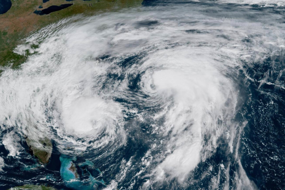 This GOES-19 GeoColor satellite image taken on Sept. 30, 2025 and provided by NOAA, shows weather systems in the Atlantic Ocean, with Hurricane Imelda on the left, and Hurricane Humberto on the right. (NOAA via AP)