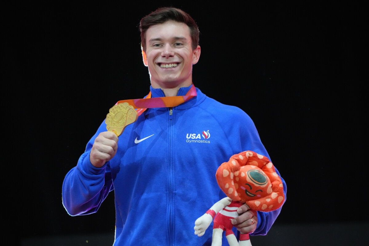 Gold medal winner, Brody Malone of the United States, poses on the podium after competing in the men's horizontal bar final during the 53rd Artistic Gymnastics World Championships in Jakarta, Indonesia, on Oct. 25, 2025. (Achmad Ibrahim/AP Photo)