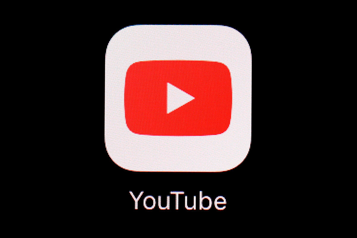 The YouTube app is displayed on an iPad in Baltimore on March 20, 2018. (Patrick Semansky/AP Photo)