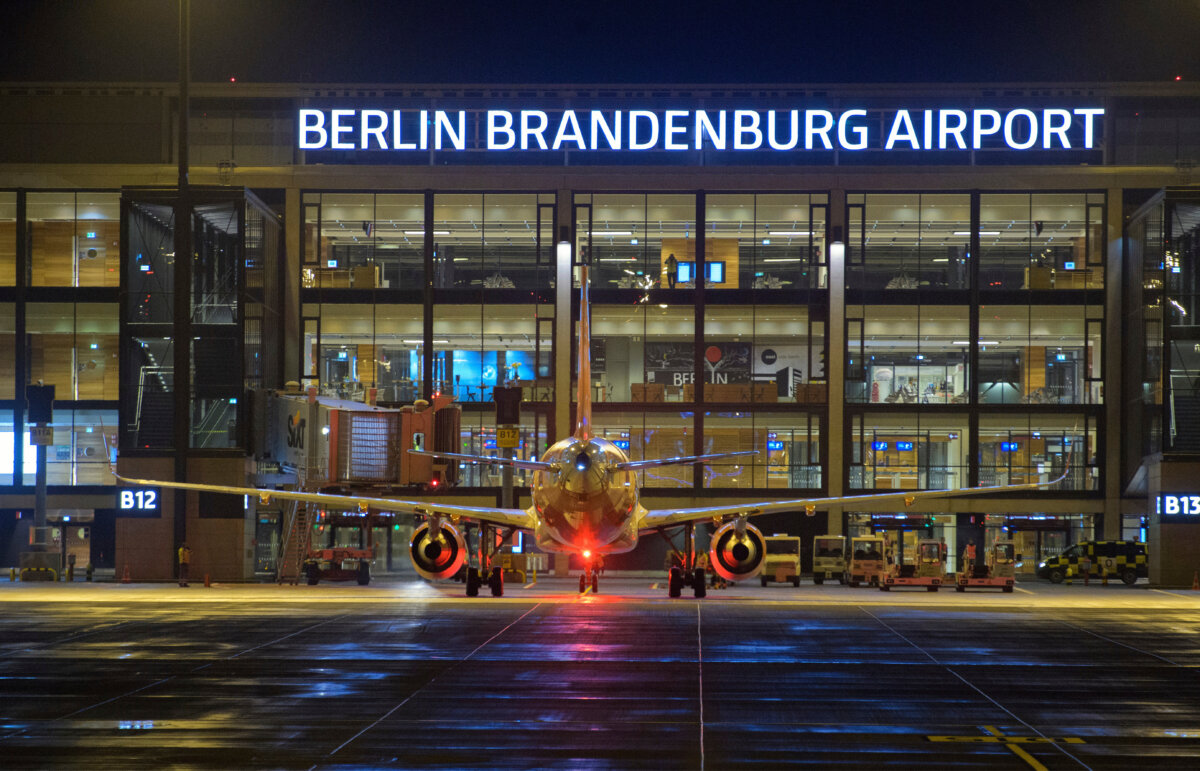An easyJet airplane will be handled at Terminal 1 in the evening after the opening of the new Berlin Brandenburg "Willy Brandt" (BER) Airport in Berlin, Germany, on Oct. 31, 2020. (Soeren Stache/dpa via AP, File)
