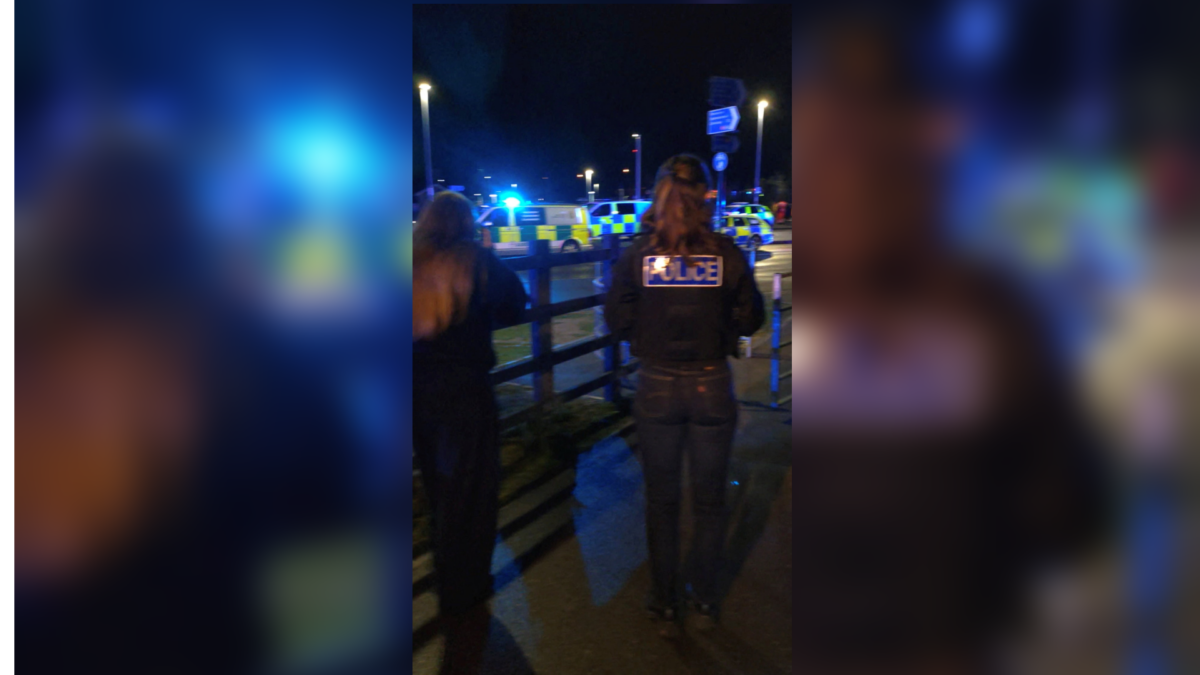 Police operate near the scene after a series of stabbings on a train near Cambridge, UK, Nov. 1, 2025, in a still from video. (Jamie Shand/via Reuters)