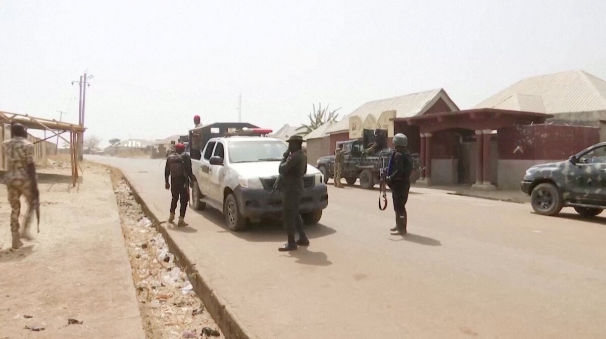 Security personnel patrol the streets amid a surge in violence in Mangu, Plateau State, Nigeria, on Jan. 24, 2024, in this screengrab obtained from video. (Reuters TV via Reuters)